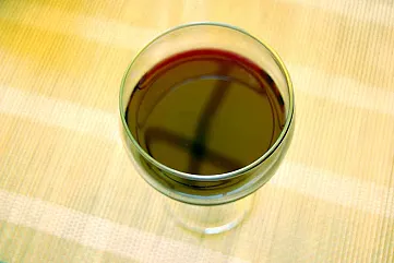 Wine glass on table from 4freephotos.com