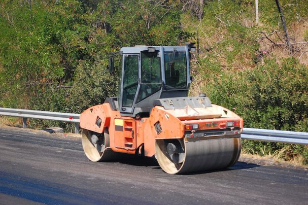 Bulldozer repairing a road from 4freephotos.com